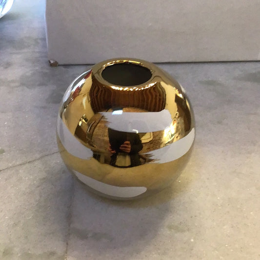 Round gold and white vase