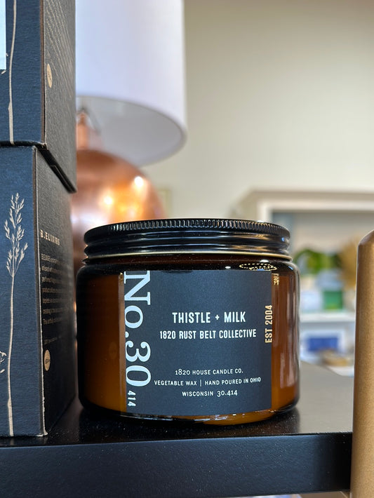 1820co. Candle lg thistle + milk